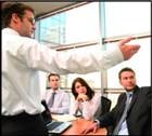 Team working through a strategy session around a conference table